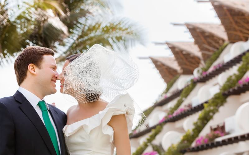 Couple kissing at Cancun Wedding