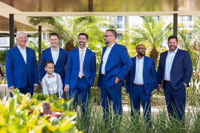 Groom and groomsmen following styling tip of wearing solid colours