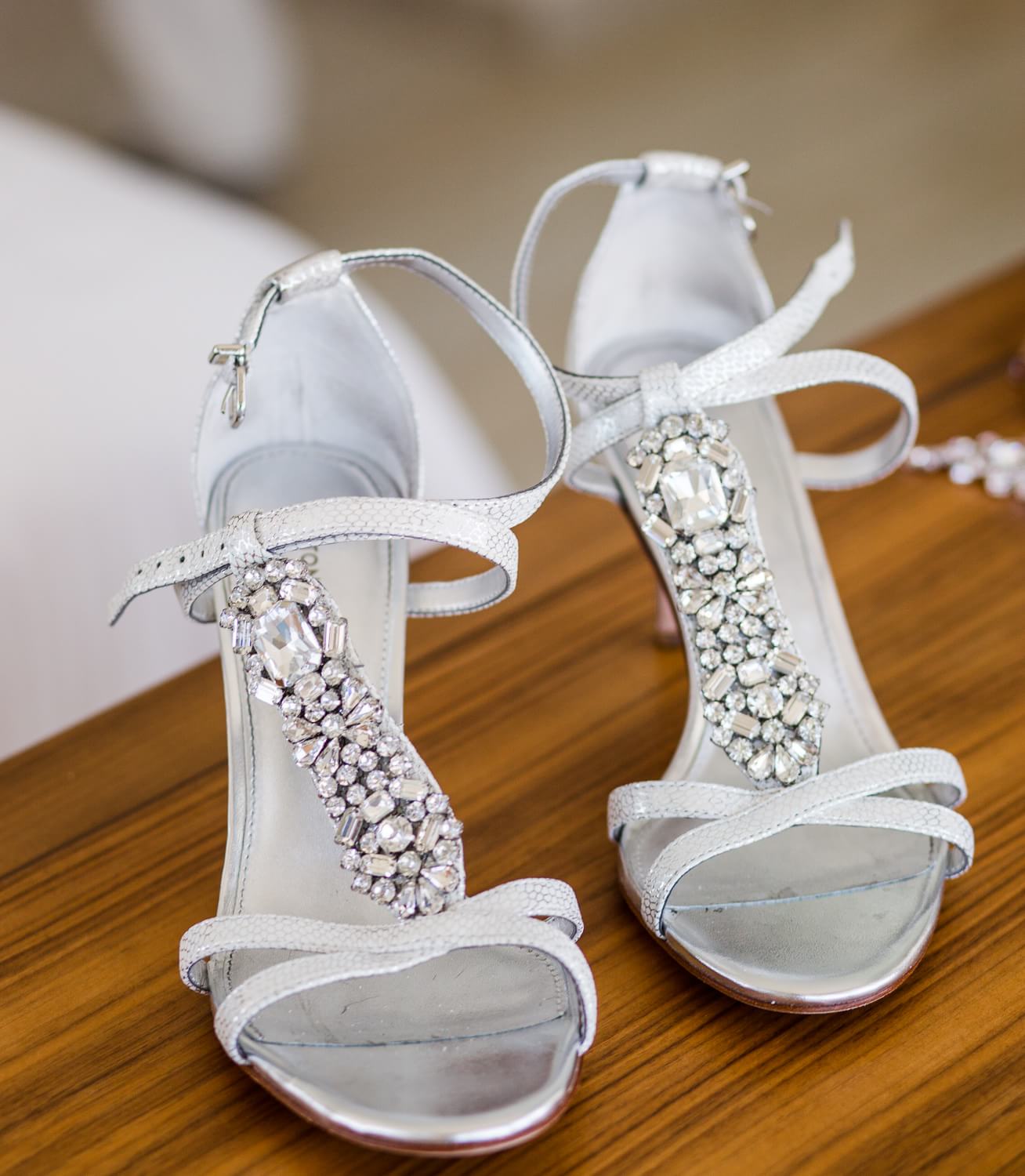 Detail of bridal shoes at wedding.