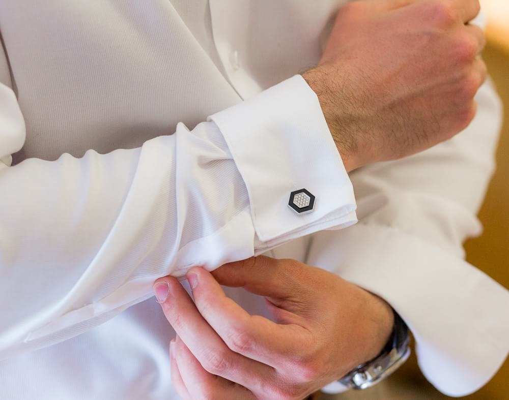 Cufflinks of groom at wedding.