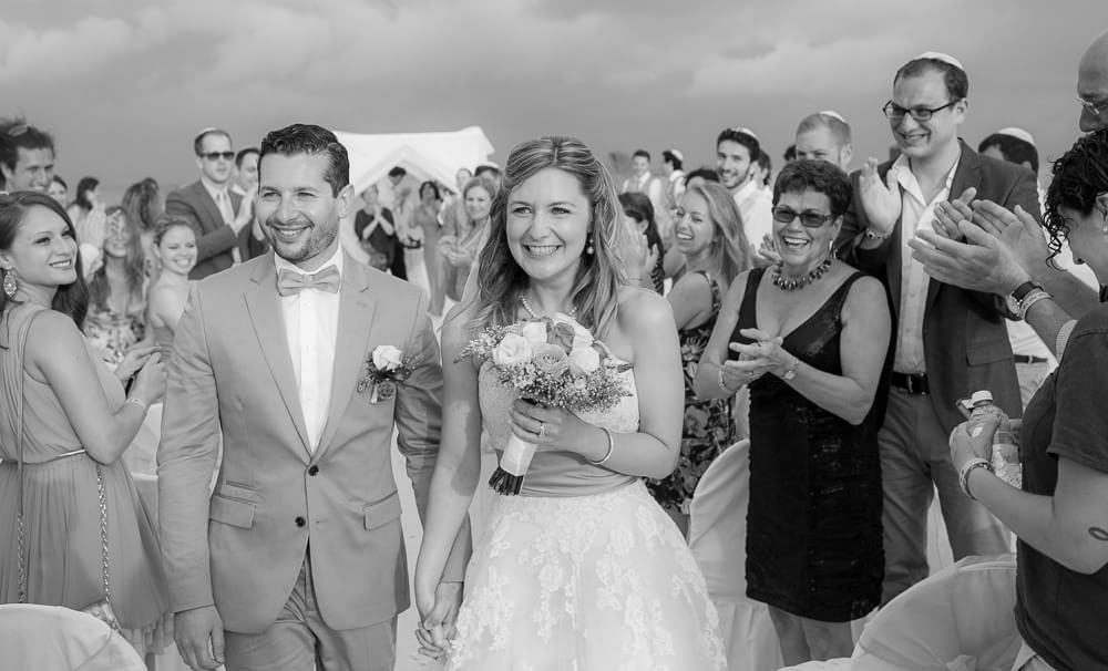 Couple walking down isle at Riviera Maya wedding