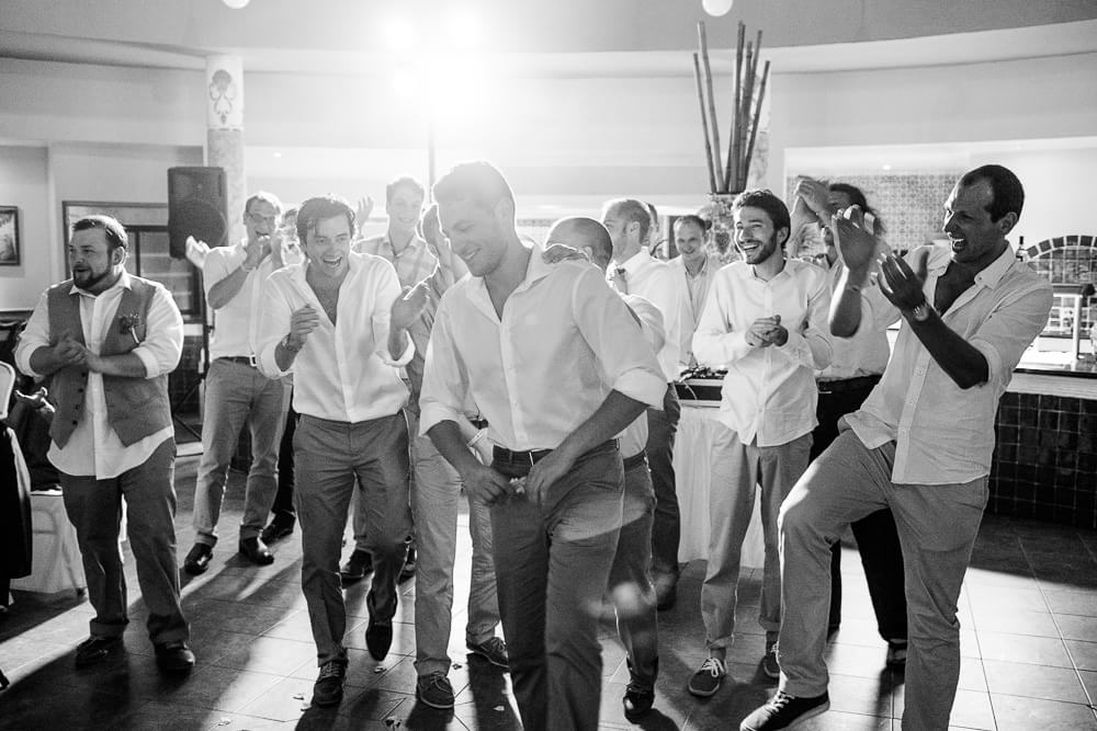 guy catches the garter at Riviera Maya wedding