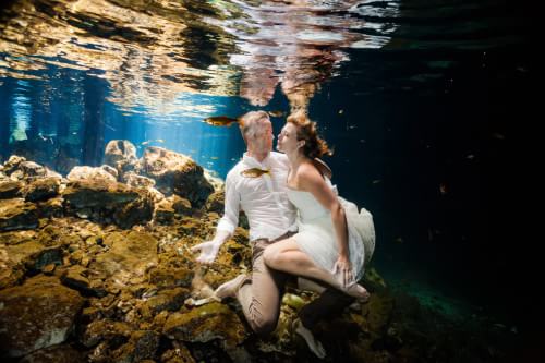 Couple underwater wedding Trash the dress in Mayan Riviera