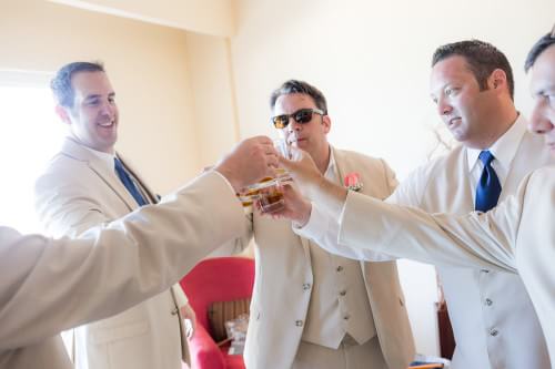 Groomsmen having a toast at Royal Playa del Carmen Wedding