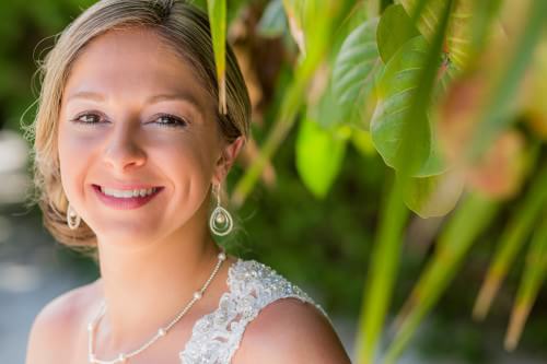 Bride smiling at Ocean Coral Turquesa Wedding