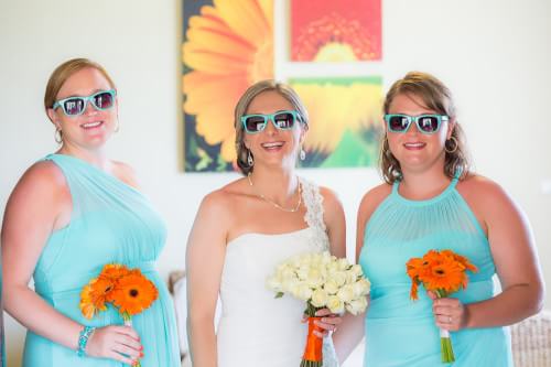 Bridesmaids smiling at Ocean Coral Turquesa Wedding