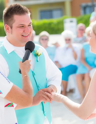 Groom's vows at Ocean Coral and Turquesa Wedding