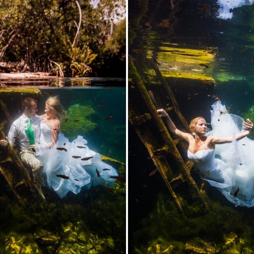 Bride and Groom posing for underwater Trash the dress in Mayan Cenote at Riviera Maya