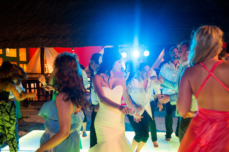 Bride dancing at wedding reception.