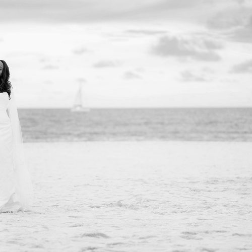 Bride and groom on beach after wedding in Mexico