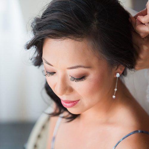 Close up of bride getting ready