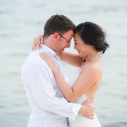 Bride and Groom on beach in Tulum