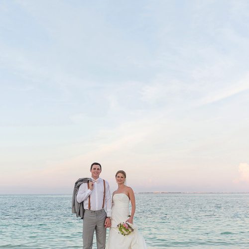 Bride and groom on beach at Excellence Playa Mujeres wedding