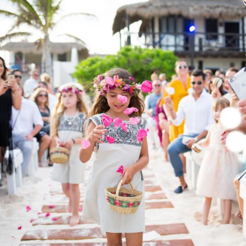 Flower girl walking down the isle | Dean Sanderson Weddings