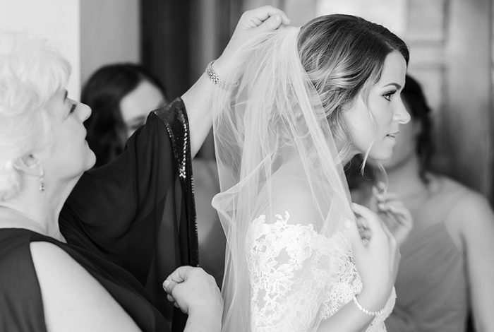 Bride having veil put in at Cancun wedding