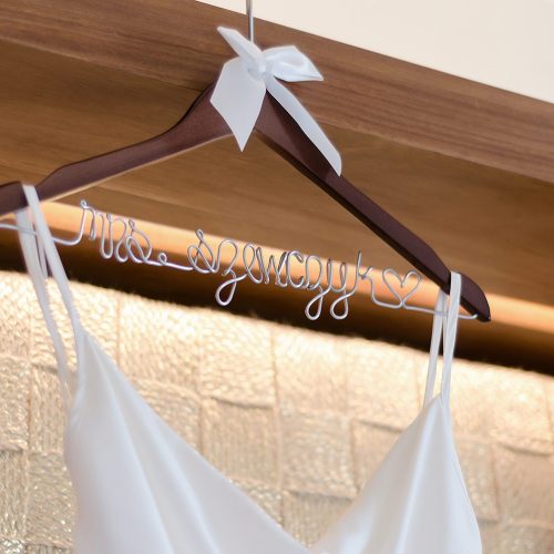 Close up of brides dress hanger