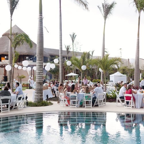 Poolside wedding reception location at Secrets Akumal Riviera Maya