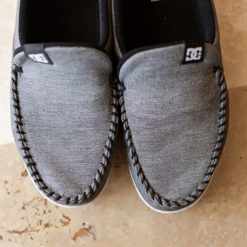 Close up detail of the shoes of the groom