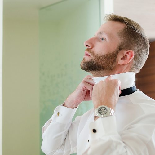 Groom getting ready at Secrets The Vine Cancun