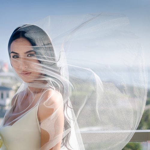 Close up of bride on balcony at Secrets The Vine Cancun