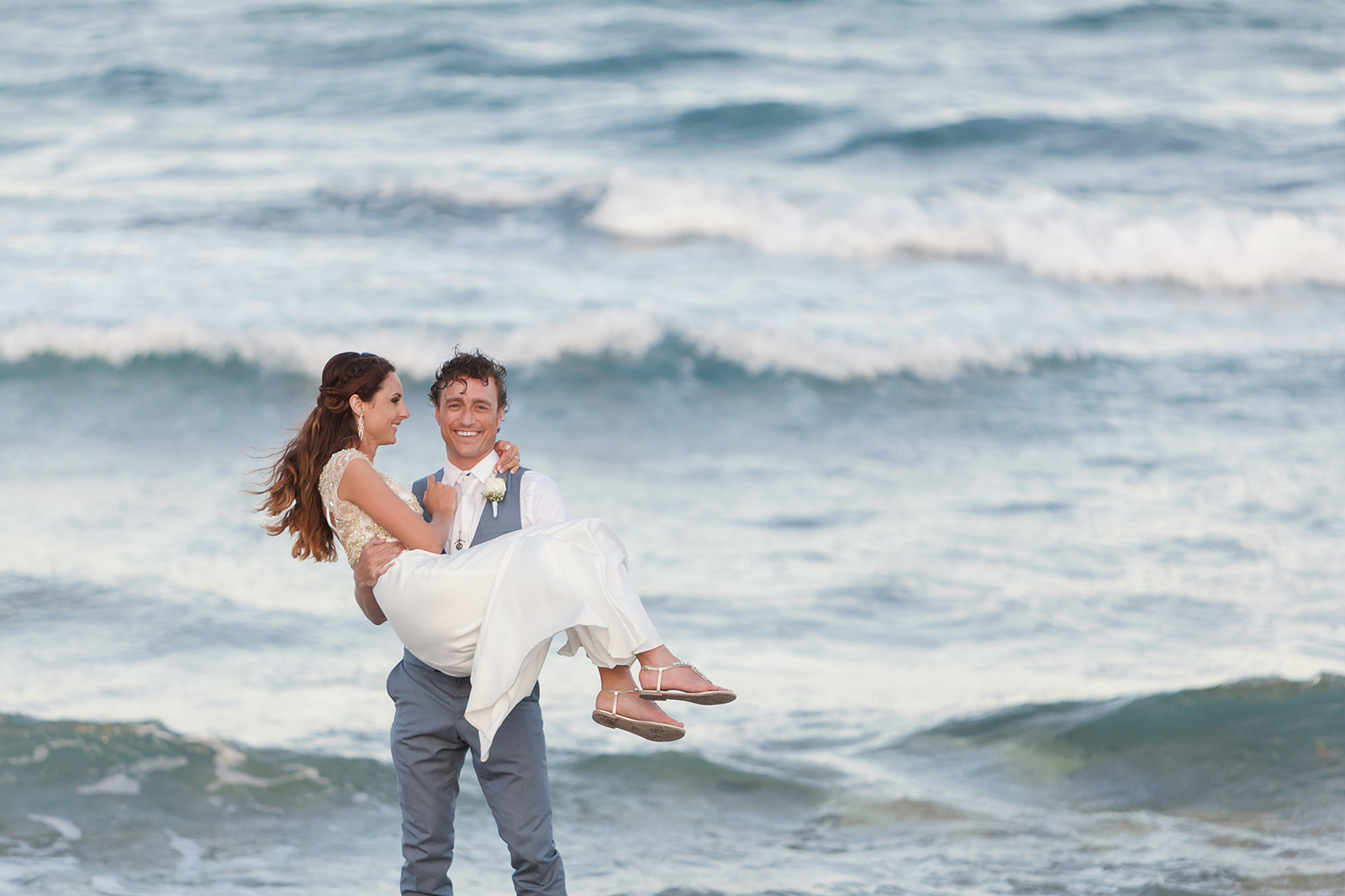 Couple at the beach Grand Sirenis Wedding