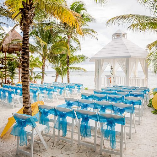 Beachside wedding ceremony location at El Dorado Seaside Suites