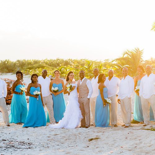 Bridal party on beach at El Dorado Seaside Suites