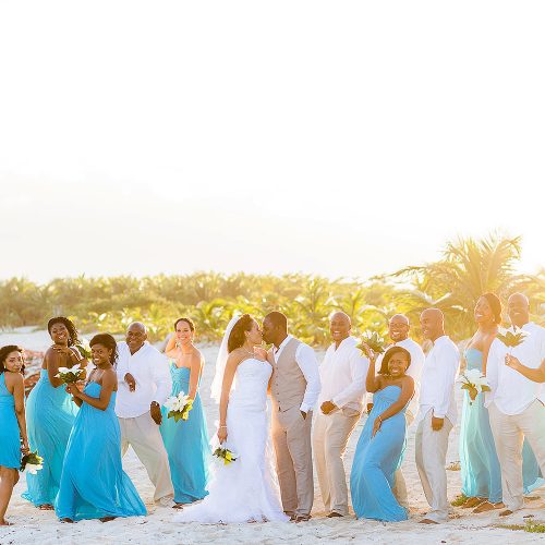 Bridal party on beach at El Dorado Seaside Suites