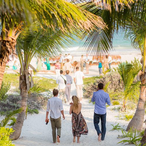 Guests walking to wedding reception in Tulum