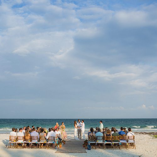 Wedding ceremony with guests at Tulum wedding