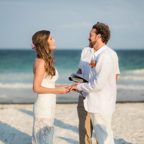 Bride and groom saying vows at Tulum wedding