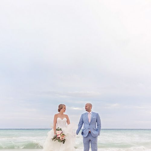 Bride and groom on beach in Riviera Maya