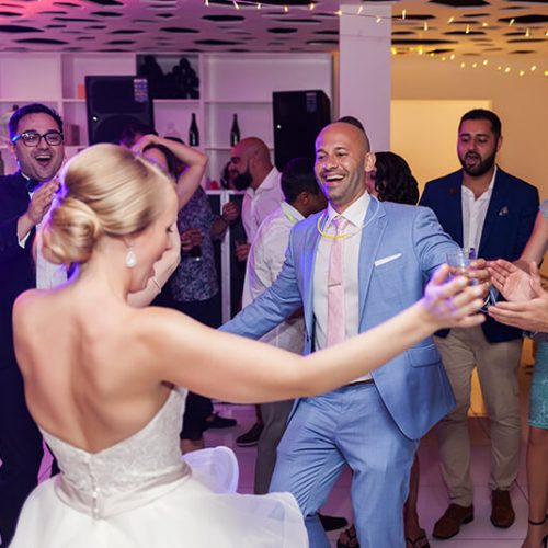Bride and groom dancing at Azul Fives Hotel