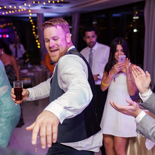 Guests dancing at Azul Fives Hotel