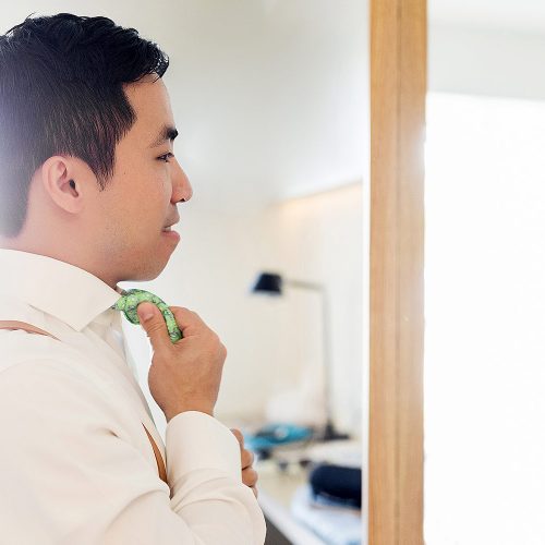 Groom getting ready for his wedding in Cancun