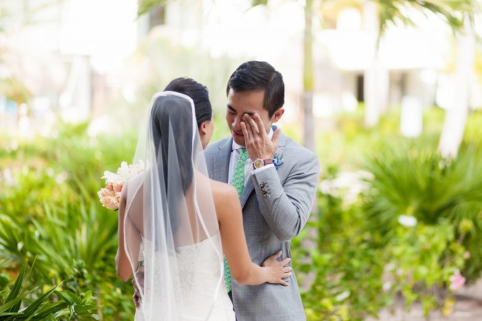 Groom crying as he see's bride for first time at Finest Playa Mujeres Resort, cancun