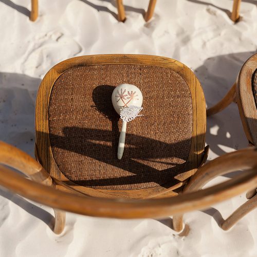 Maraca on chair at wedding ceremony at el Paraiso Tulum