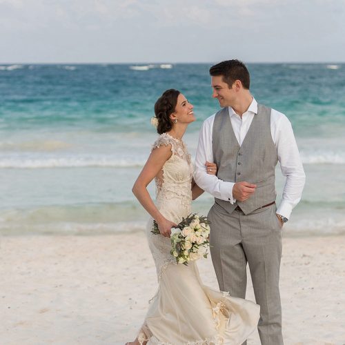Bride and groom portrait on beach in Tulum