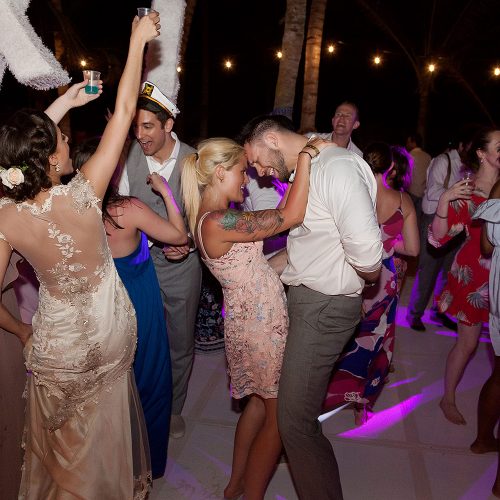 Guests dancing at wedding reception in Tulum