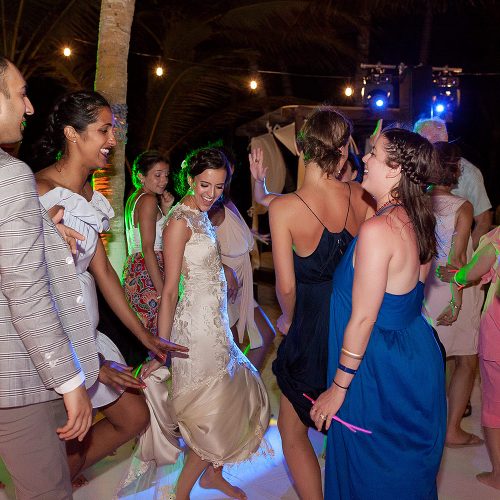 Bride dancing at wedding in Tulum