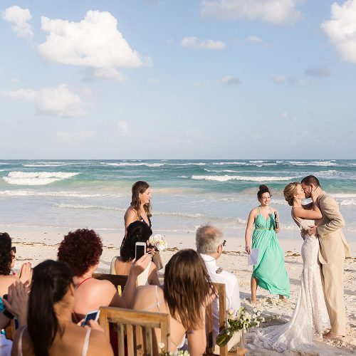 Bride and groom at beach wedding in Tulum