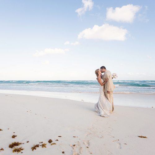 Romantic kiss, bride and groom after wedding in Tulum