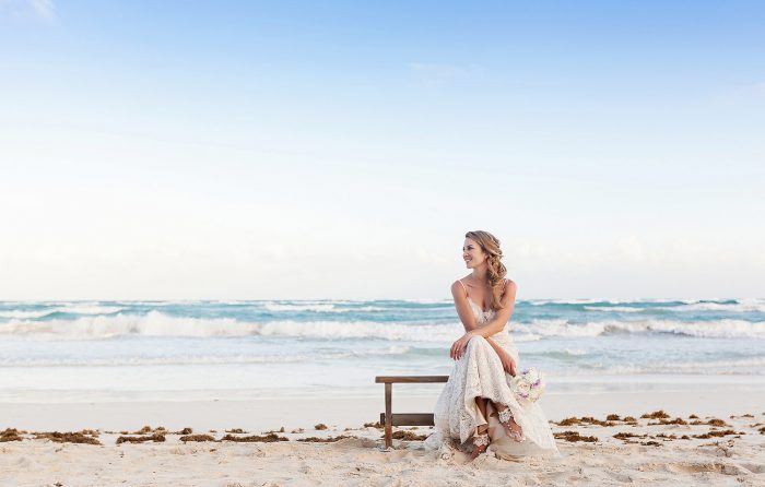 Portrait of bride on bench in Tulum