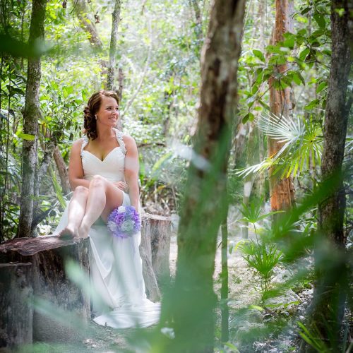 Bride and bouquet at Trash the dress in Mayan Cenote at Riviera Maya