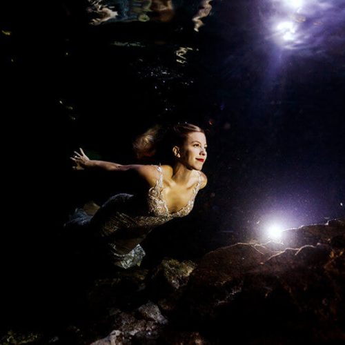 Bride underwater in Mayan cenote Trash the dress