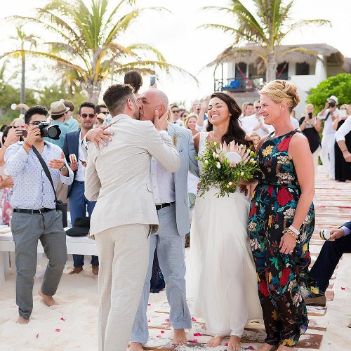 Bride and groom meeting at wedding ceremony on beach