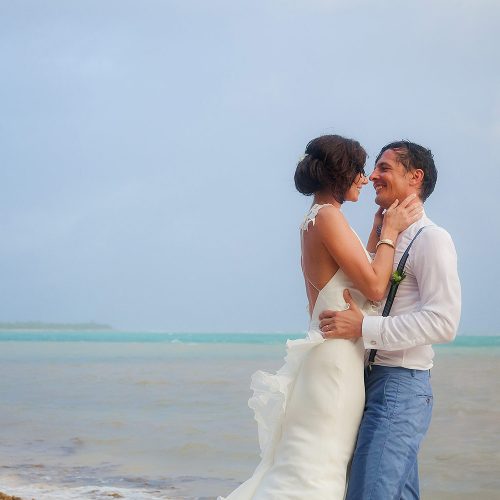 Bride and groom being romantic after wedding in Tulum