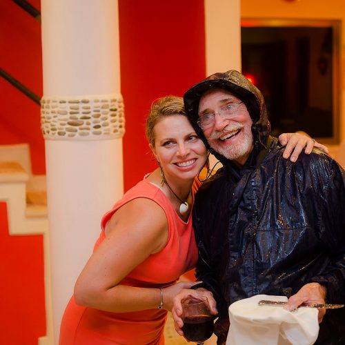 Father of the bride with a rain coat on in tulum