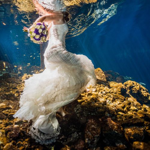 Wedding dress underwater in Mayan cenote Trash the dress