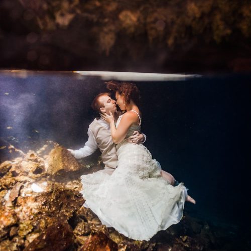 Bride and Groom underwater in Trash the Dress, Riviera Maya, Mexico